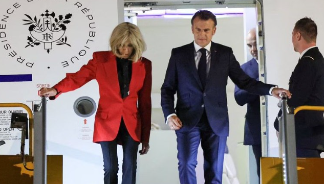 French President Macron’s Viral Moment, Wife Shoves His Face – Caught On Camera​